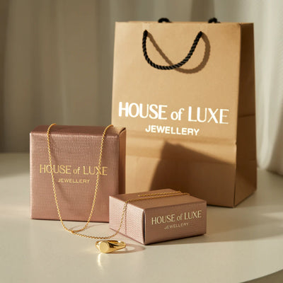 ELEGANTE ZIRKONIA-OHRRINGE IN GOLD