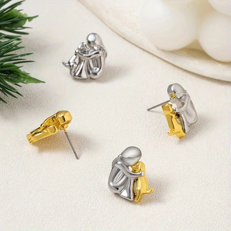 SILBERNE UND GOLDENE ZWEIFARBIGE OHRRINGE ZUM UMARMEN